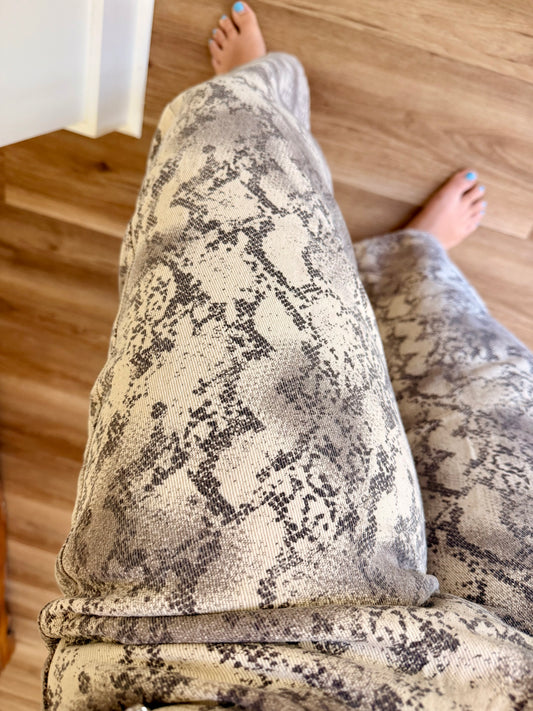 Snake print barrel jean